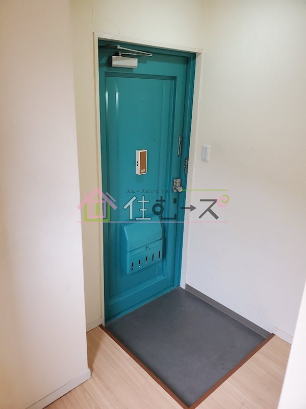 豊里丸富マンション 玄関