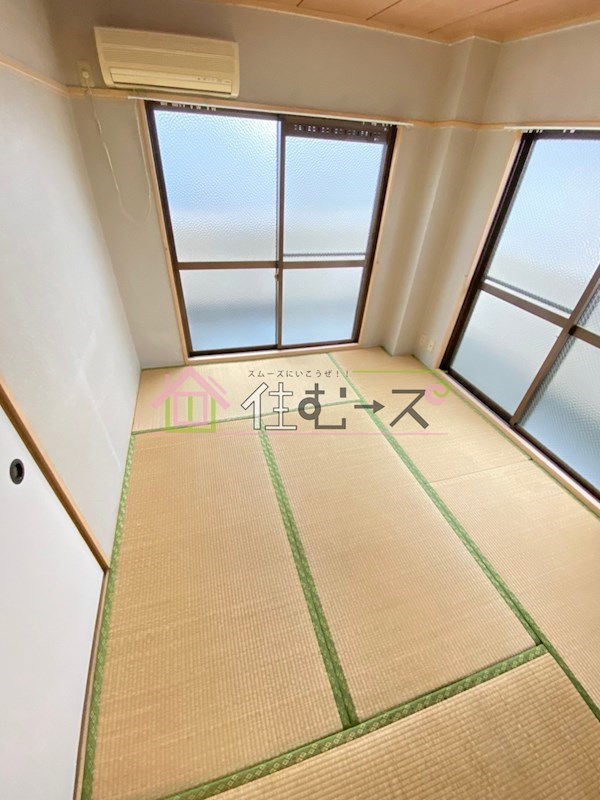 プチハイツタナカ ベッドルーム