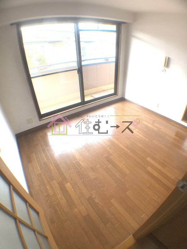 ラッキーセンター河堀口マンション ベッドルーム