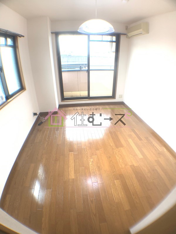 ラッキーセンター河堀口マンション ベッドルーム