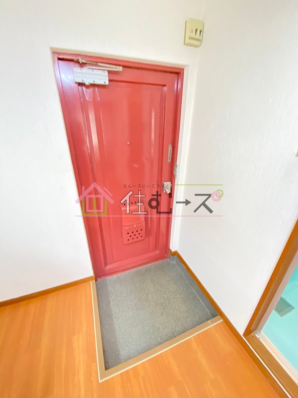 ライオンズ長峡 玄関