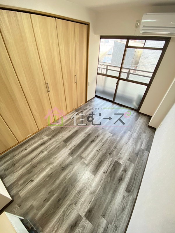 大国町池田マンション ベッドルーム