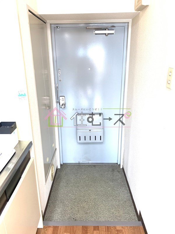グランベイ豊新 玄関