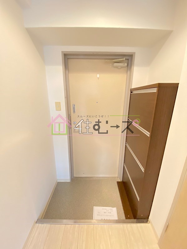 ロイヤルメゾン上新庄 玄関