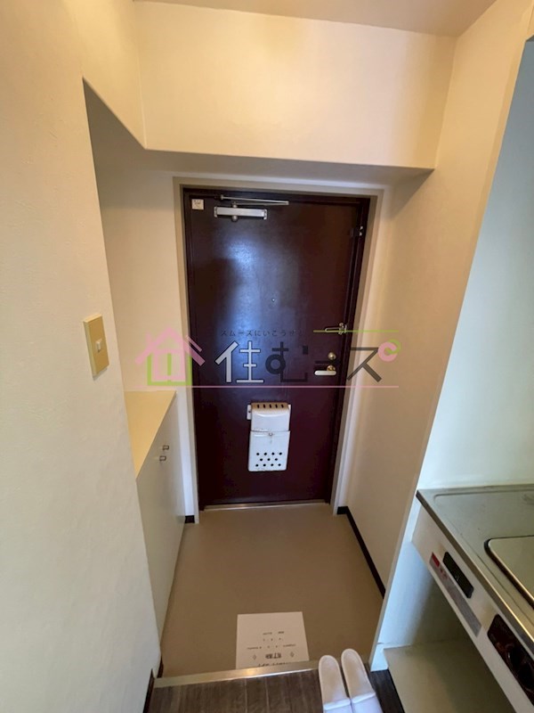 リアライズ西淡路 玄関