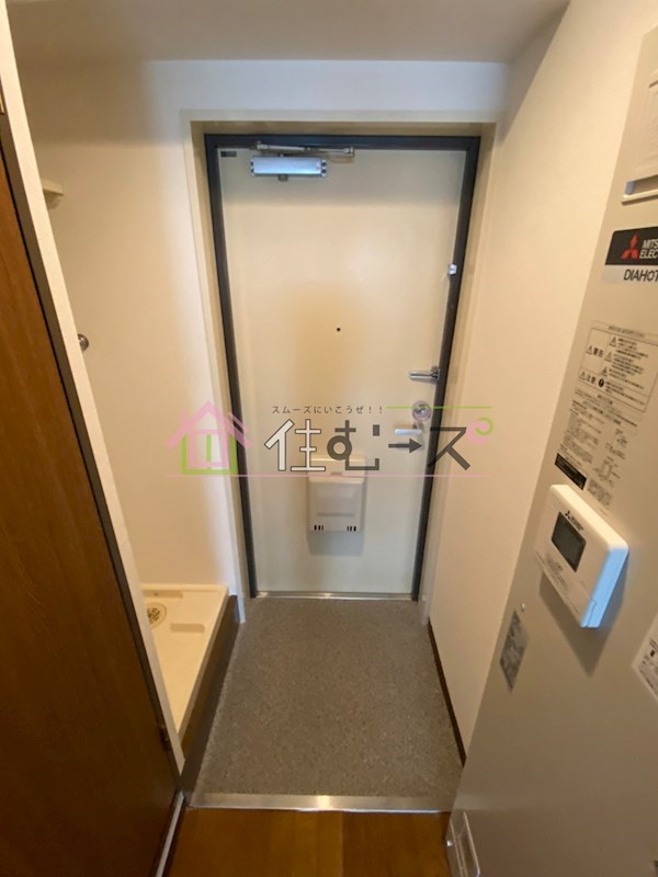 コスモコート大南 玄関