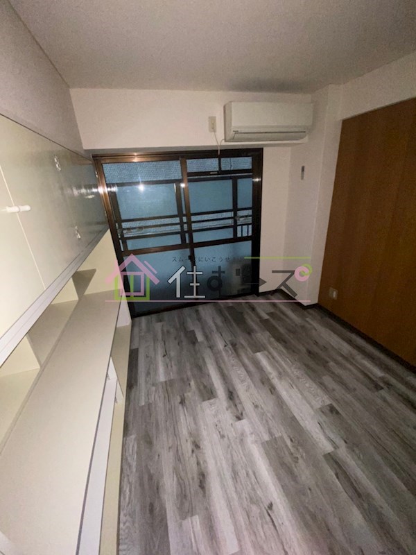 大国町池田マンション ベッドルーム