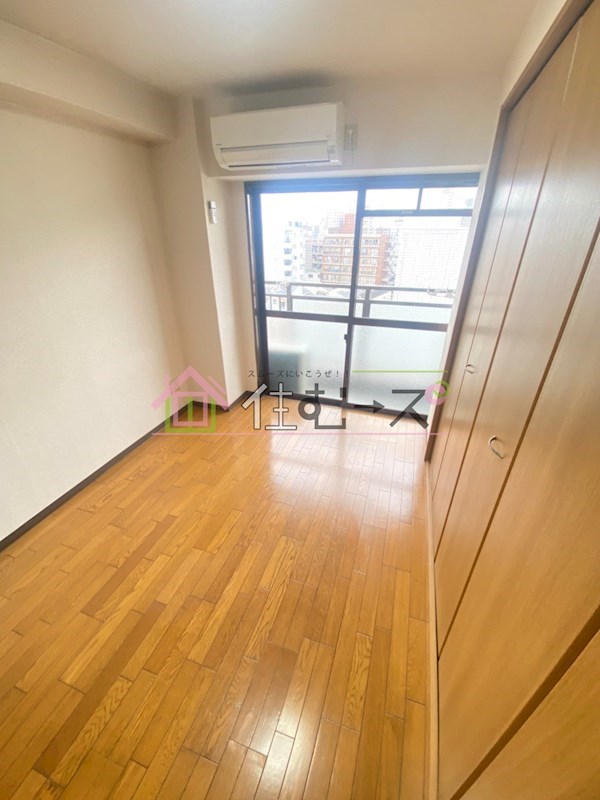 大国町池田マンション ベッドルーム