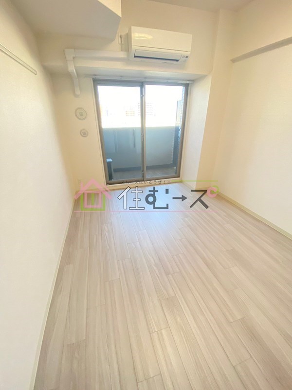 プレサンスOSAKA DOMECITYクロスティ ベッドルーム