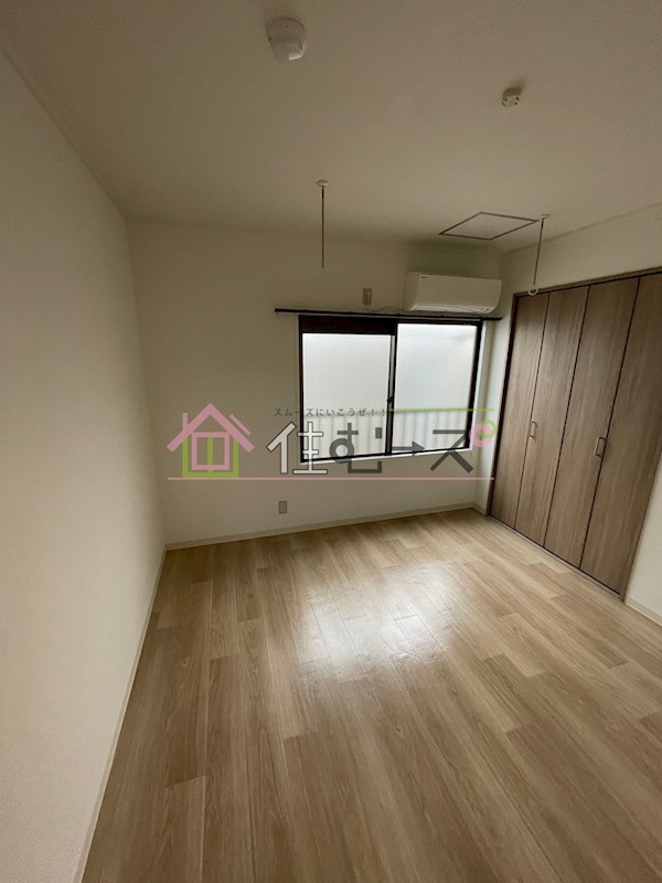 公園造住マンション ベッドルーム