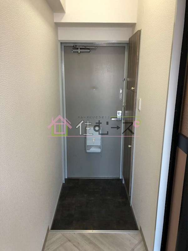 クリア塚本 玄関
