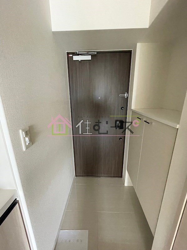 ファーストフィオーレ九条 玄関