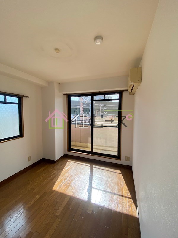 ラッキーセンター河堀口マンション ベッドルーム