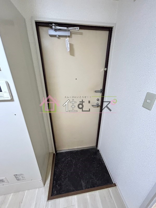 ロイヤル加美北 玄関