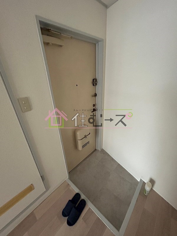 エスペリアー小松 玄関