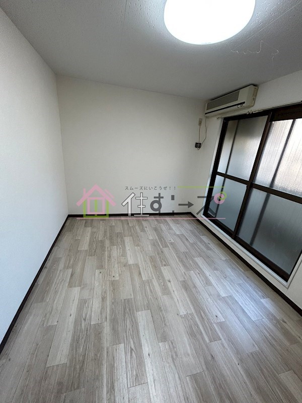 メゾン西淡路 ベッドルーム