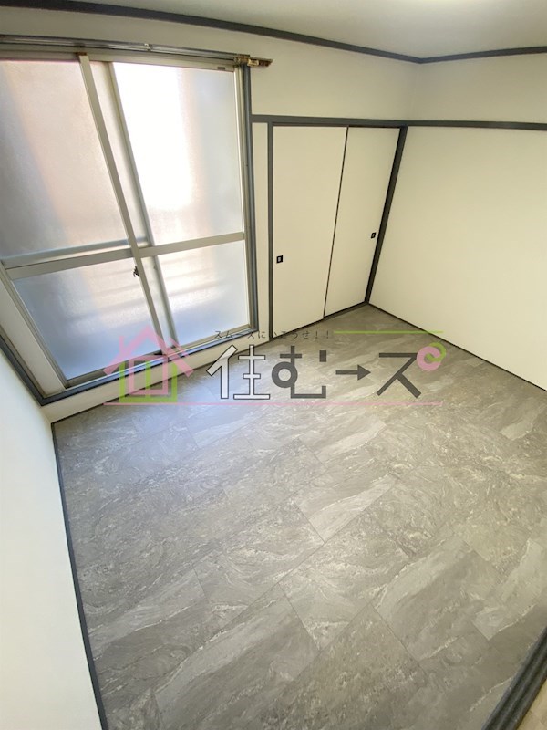 立知塚本ビル ベッドルーム