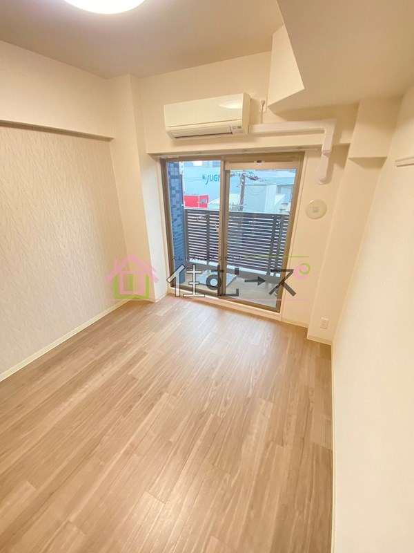 プレサンスOSAKA DOMECITYスクエア ベッドルーム