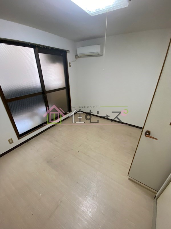 三明ハイツ ベッドルーム