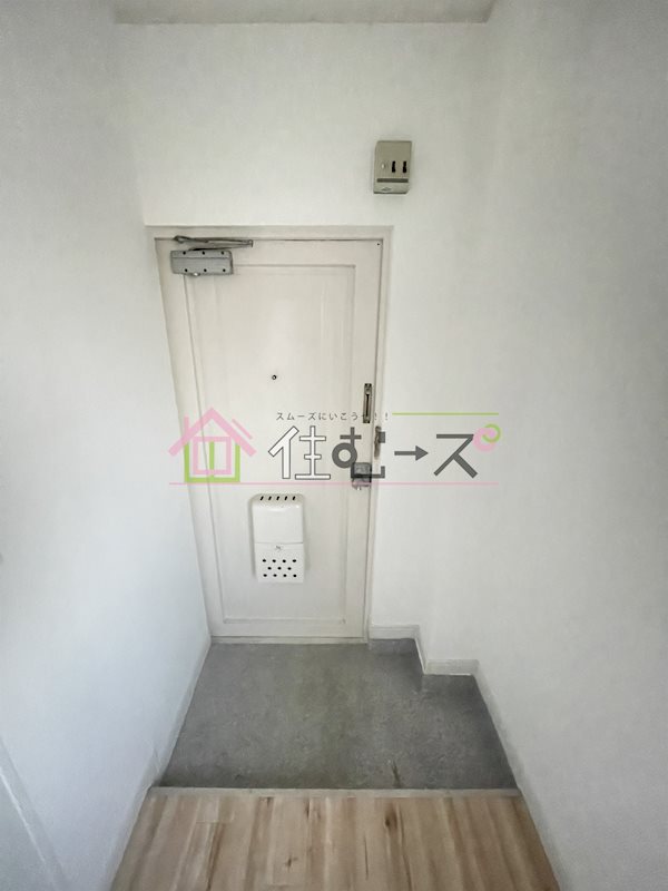 ライオンズ長峡 玄関
