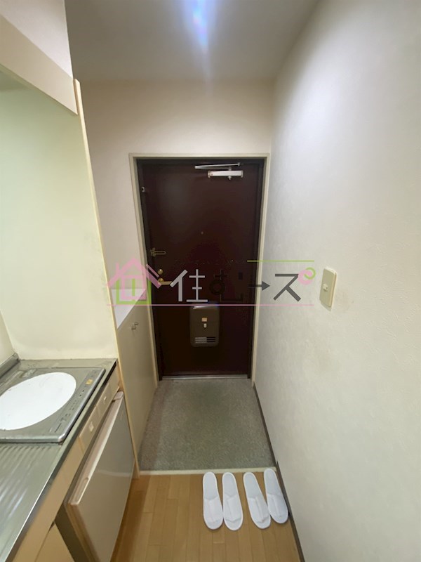 リアライズ西淡路 玄関