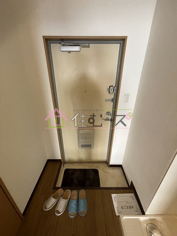 レスポワル新町 玄関