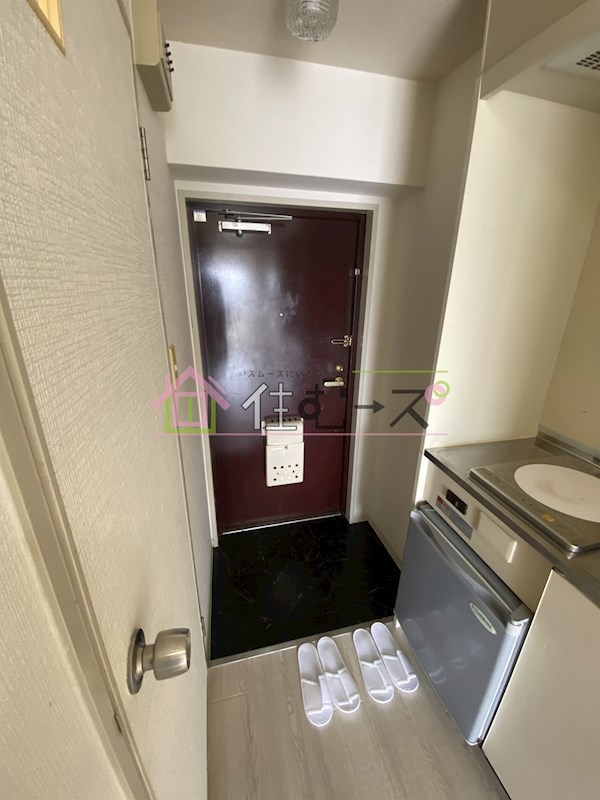 リアライズ西淡路 玄関