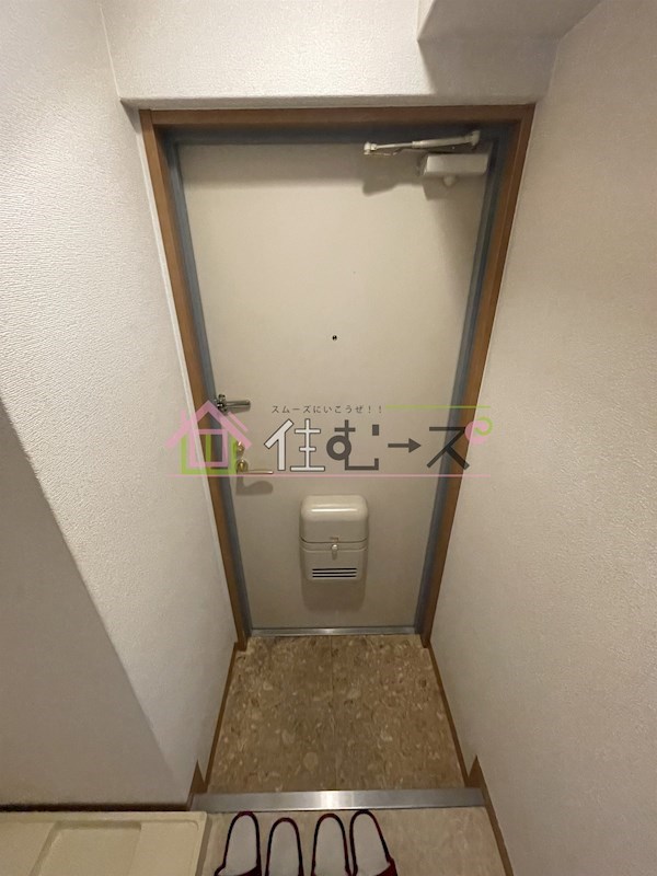 クイーンズコート 玄関