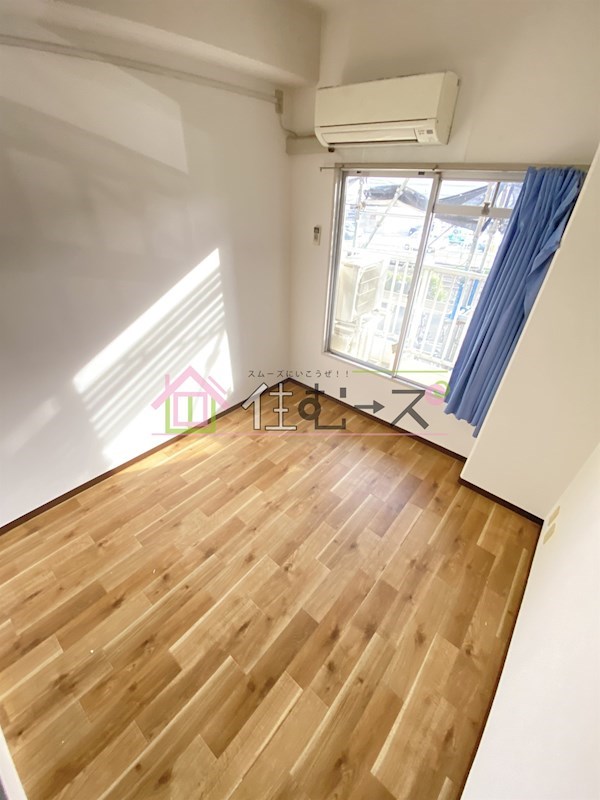 アメニティー新高一番館 ベッドルーム