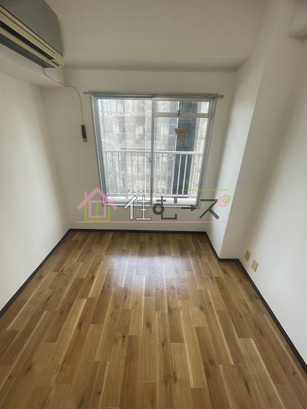 アメニティー新高一番館 ベッドルーム