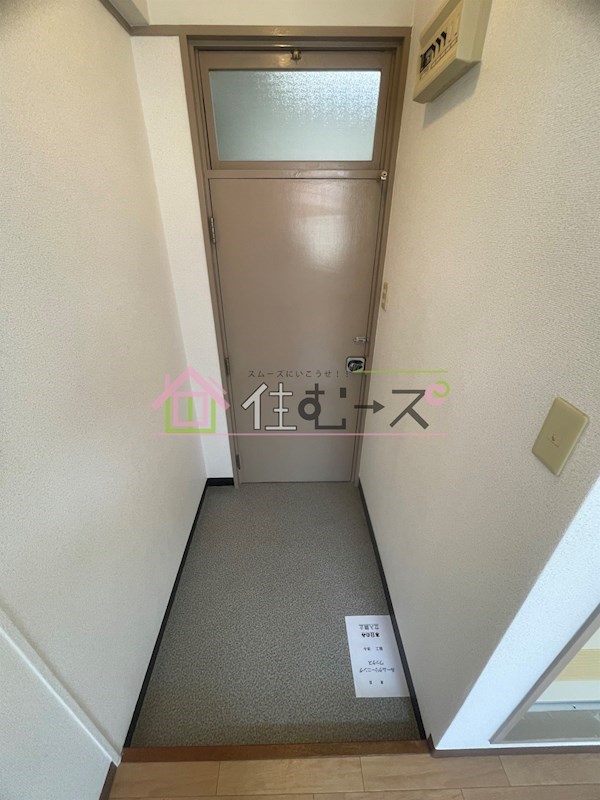 フレンドリー十三東 玄関