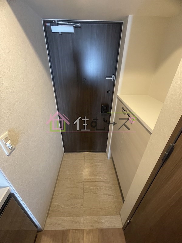 ファーストフィオーレ九条 玄関