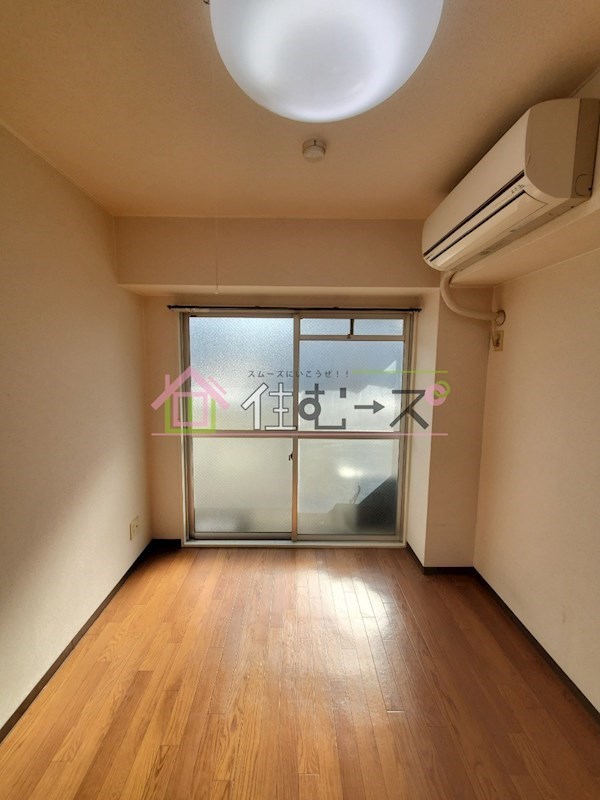 淡路エンビィハイツ ベッドルーム