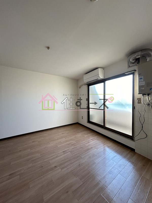 マンションコスモⅢ ベッドルーム