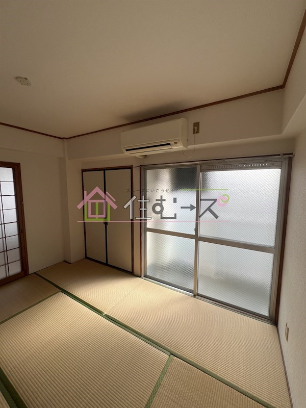サンプラザ新北野A棟 ベッドルーム