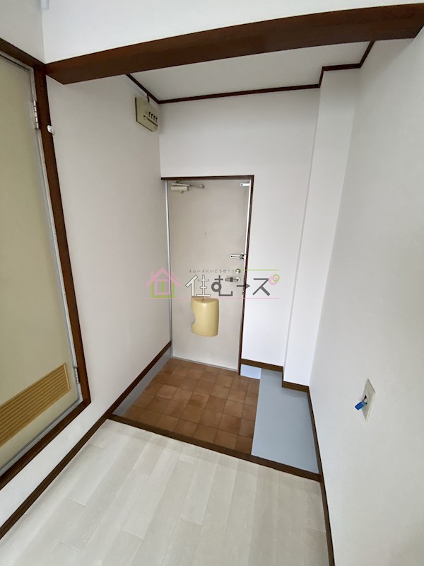 KANESHIRO豊里マンション 玄関