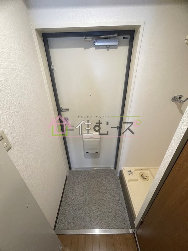 コスモコート大南 玄関
