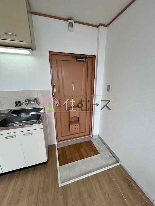 ロイヤル遠里小野 玄関