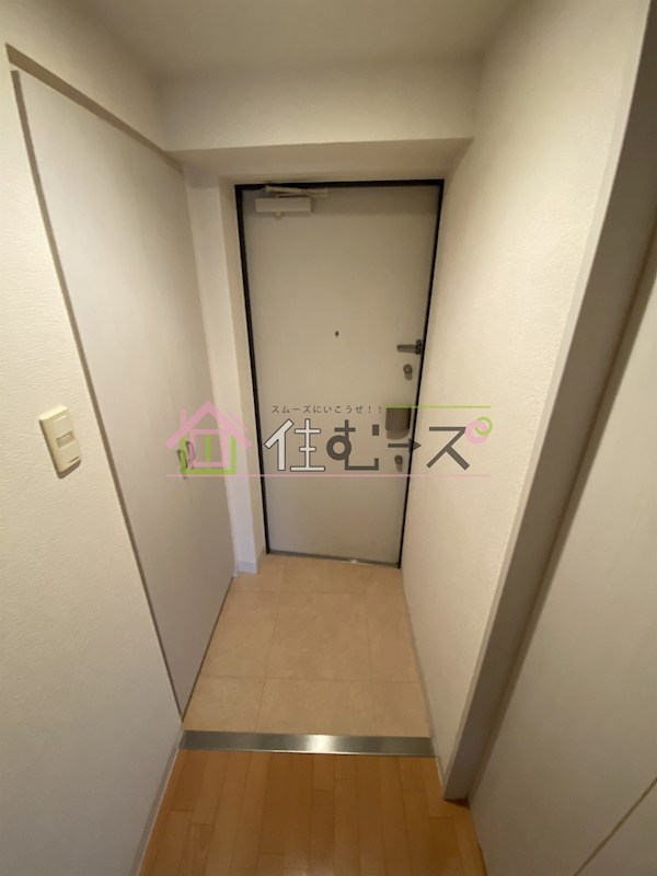 メロディア塚本 玄関