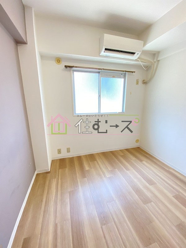 メゾンさやか ベッドルーム