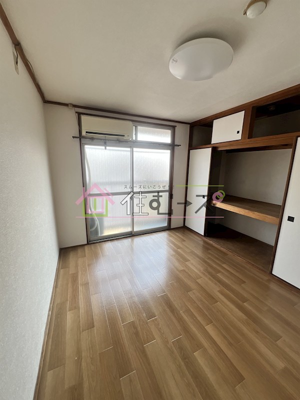 かねまつ上新庄マンション ベッドルーム