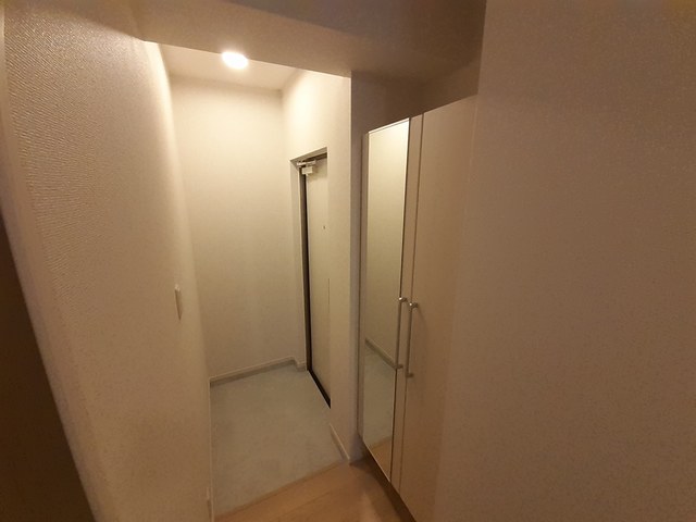 コンヴァージ岸部 玄関
