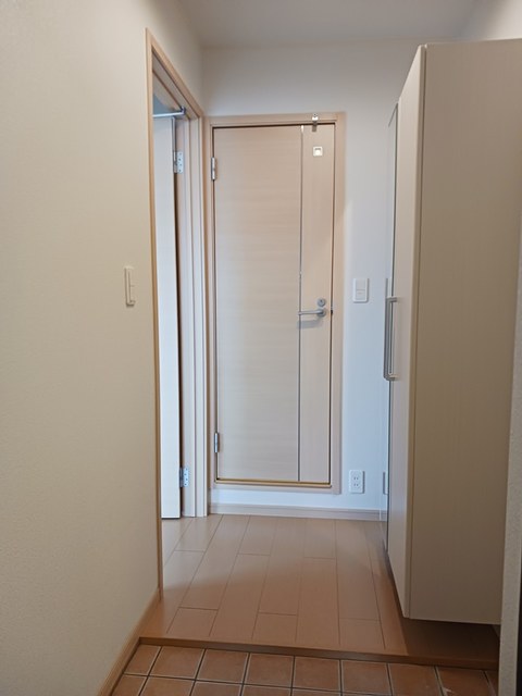 コモド　カーサ 玄関