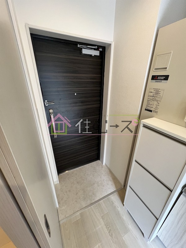 エストゥルースプラス大阪福島 玄関