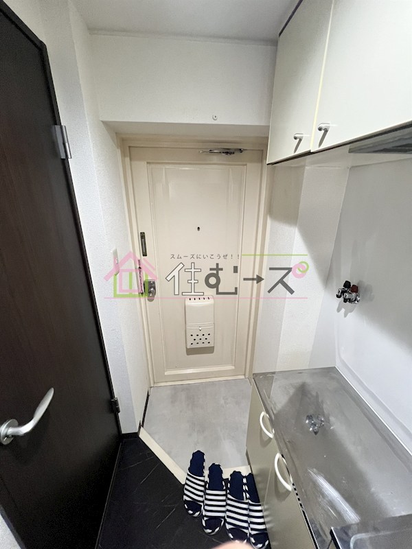 サンスリーハイツ京橋 玄関