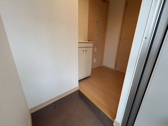 プリマベーラくずは 玄関