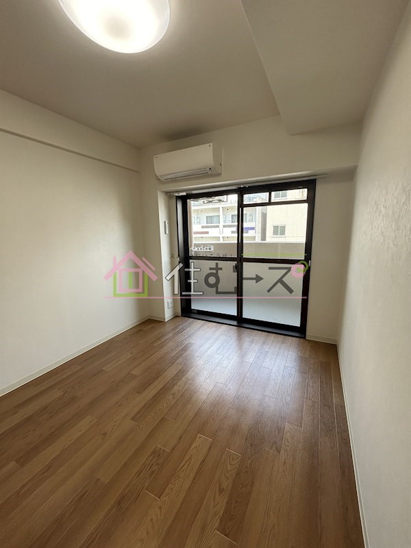 ローズコーポ西中島 ベッドルーム