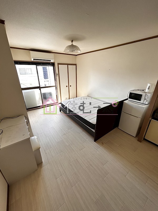 万代北村マンション ベッドルーム