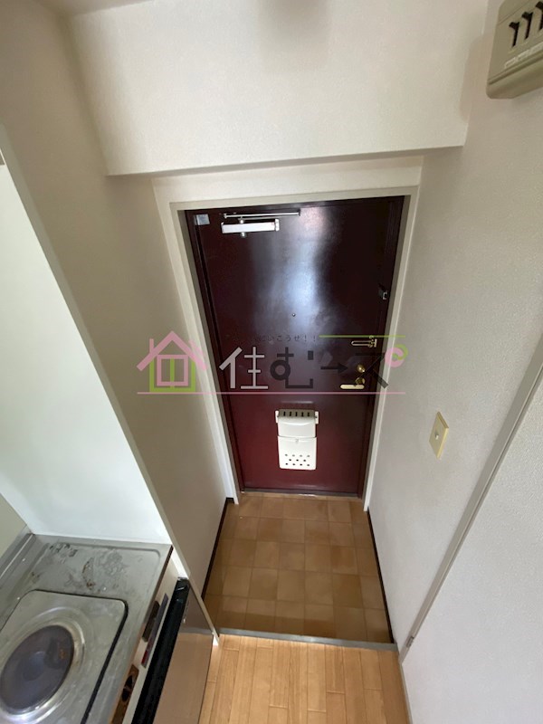 リアライズ西淡路 玄関