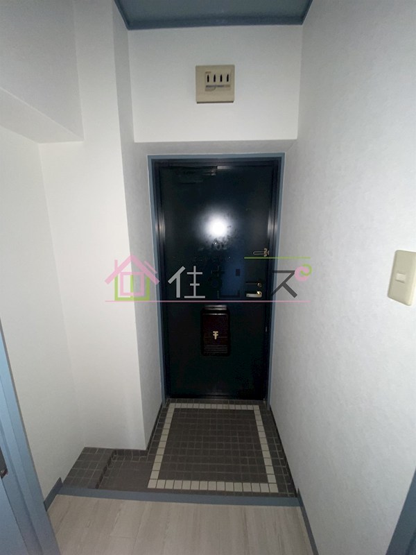 シオザキビル 玄関